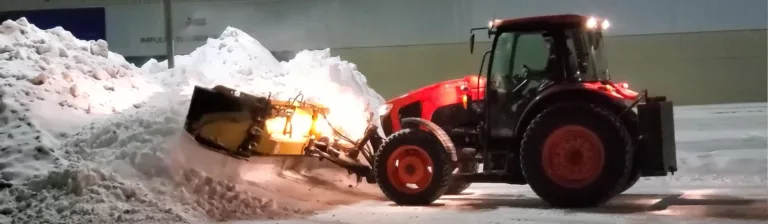 snow piles in parking lots